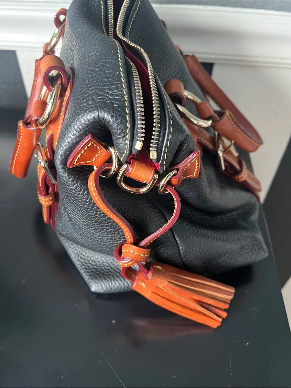Dooney & Bourke Black Pebbled Leather Satchel with Brown Trim